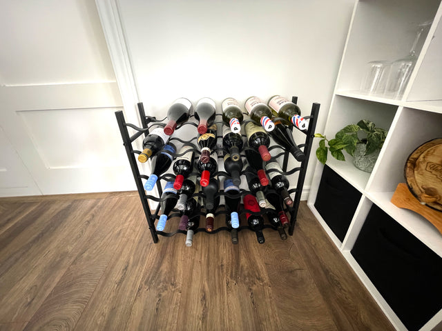 Freestanding floor wine rack black metal from The Rack Co. Wine Storage and Display Accessories