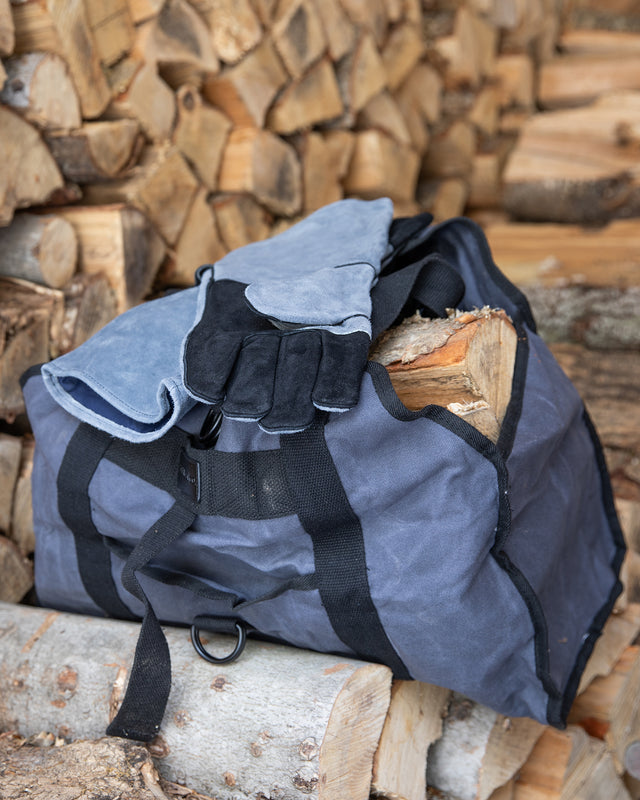 Grey duffle log carrying bag waxed indoor outdoor with leather heat-resistant fire gloves for indoor fireplace or outdoor firepit or smoker. Perfect gift for dad. The Rack Co