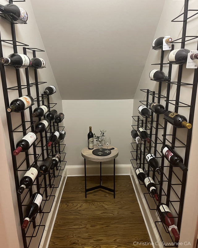 Under staircase wine room cellar featuring Double-Frame wall mounted wine racks by The Rack Co