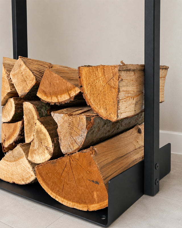 Close-up of the Nordic firewood rack showing its heavy-duty steel construction, made in Québec Canada.