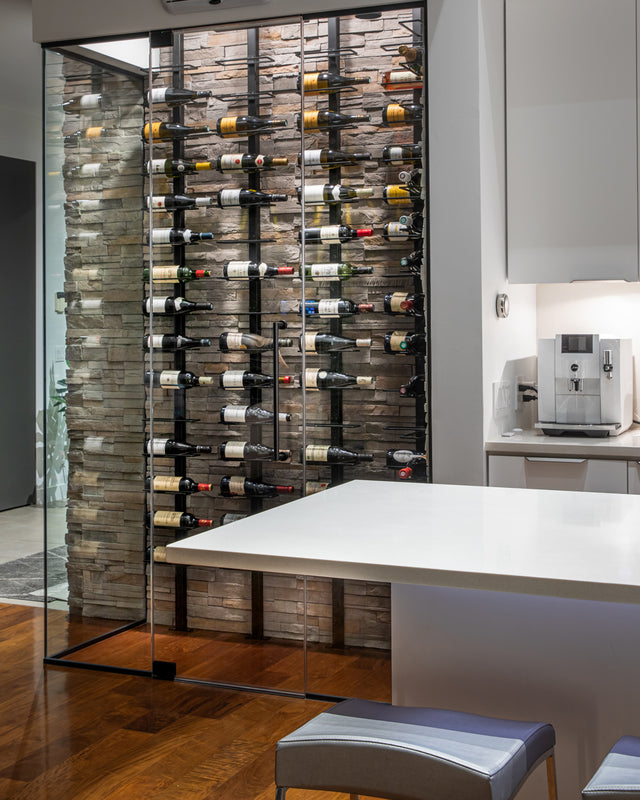 Orford floor-to-ceiling wine cellar installation in a modern glass-enclosed wine room